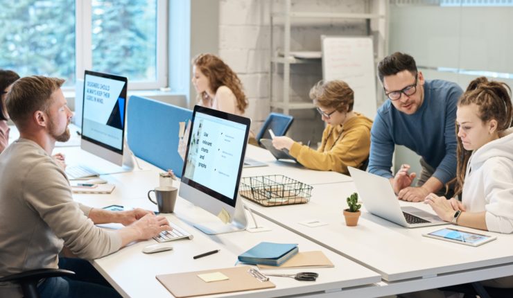 people around a desk