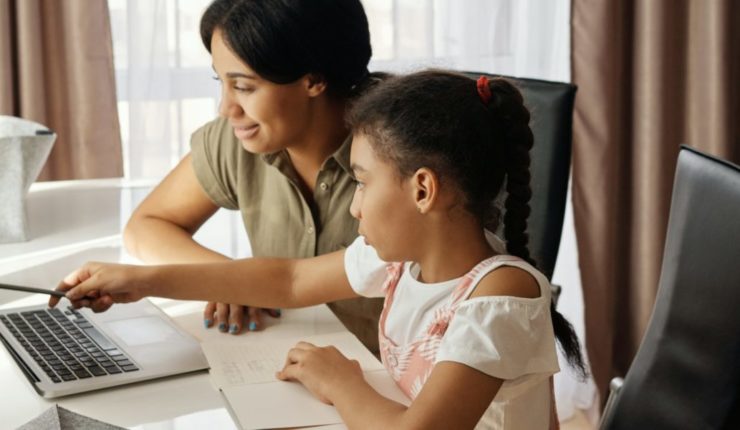 mother-helping-her-daughter-with-her-homework