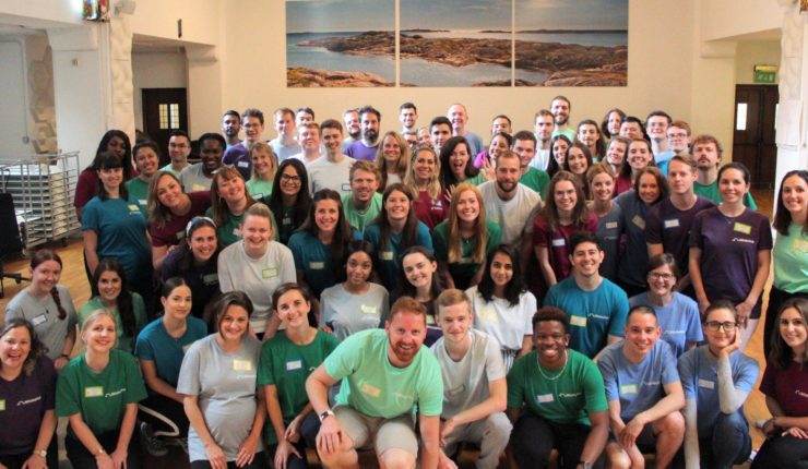 large group of people smiling for a photo