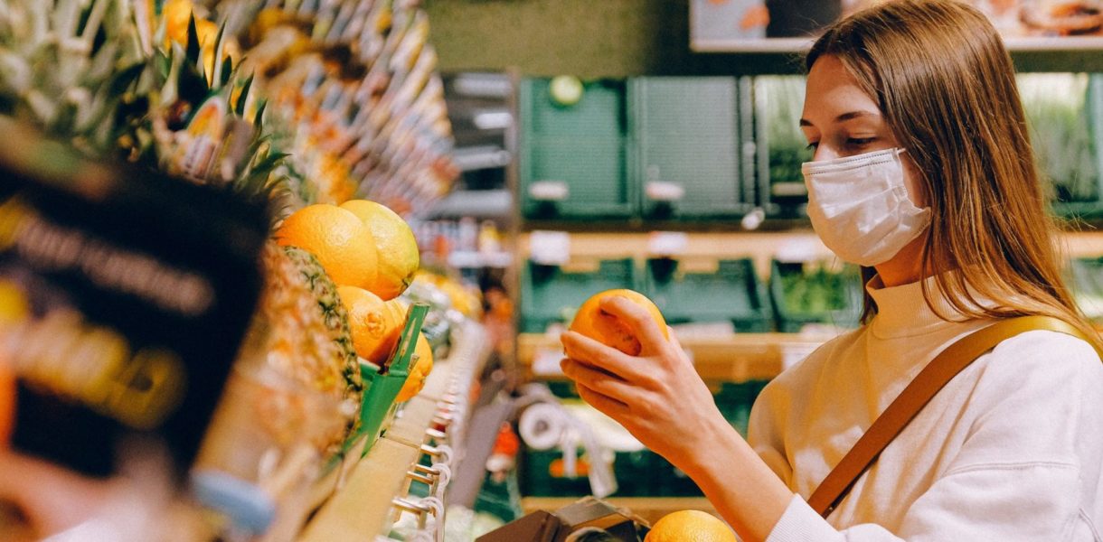woman wearing mask in supermarket