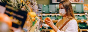 woman wearing mask in supermarket