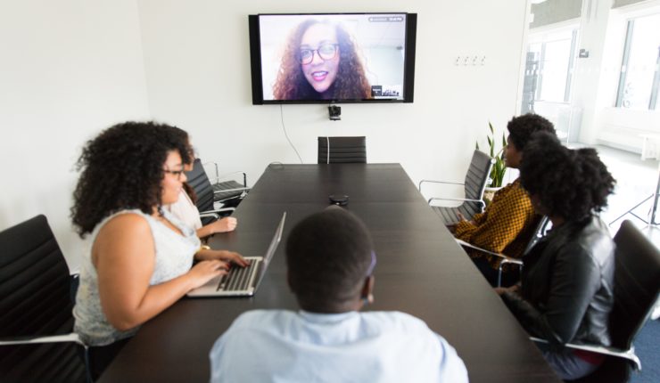 social distance conference call 3 people and a monitor