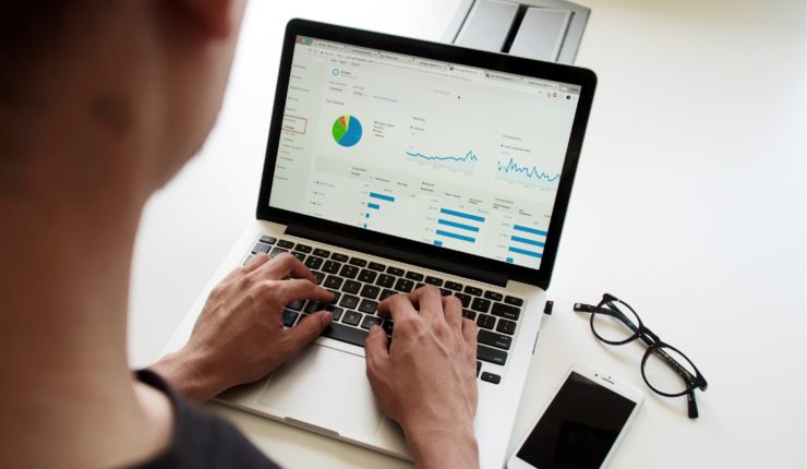 Looking at data on a laptop