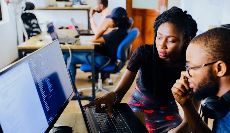male ad female working together on computer