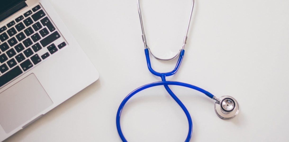 stethoscope and laptop