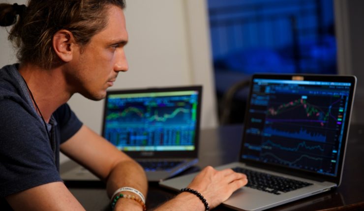 Man using laptop for data