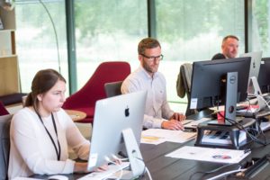 working in an office using desktops