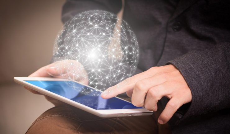 Using I pad with cyber security symbol