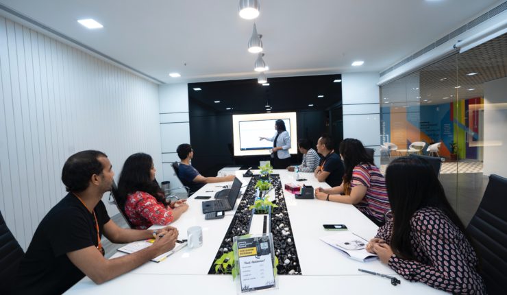 men and women in meeting