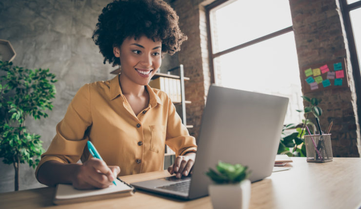 Lady happy on a computer