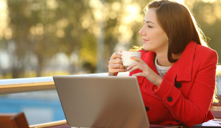 Entrepreneur,With,A,Laptop,Relaxing,In,A,Coffee,Shop,And