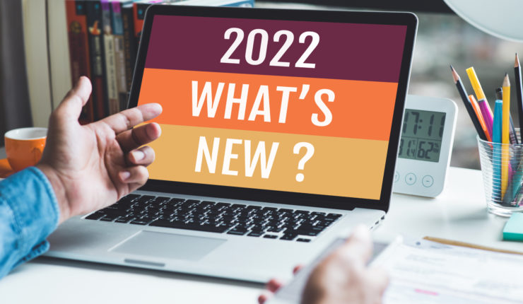 Man looking at laptop that 2022 whats new on the screen