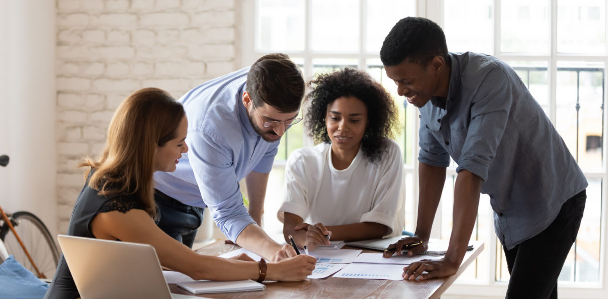 men and women working in the office