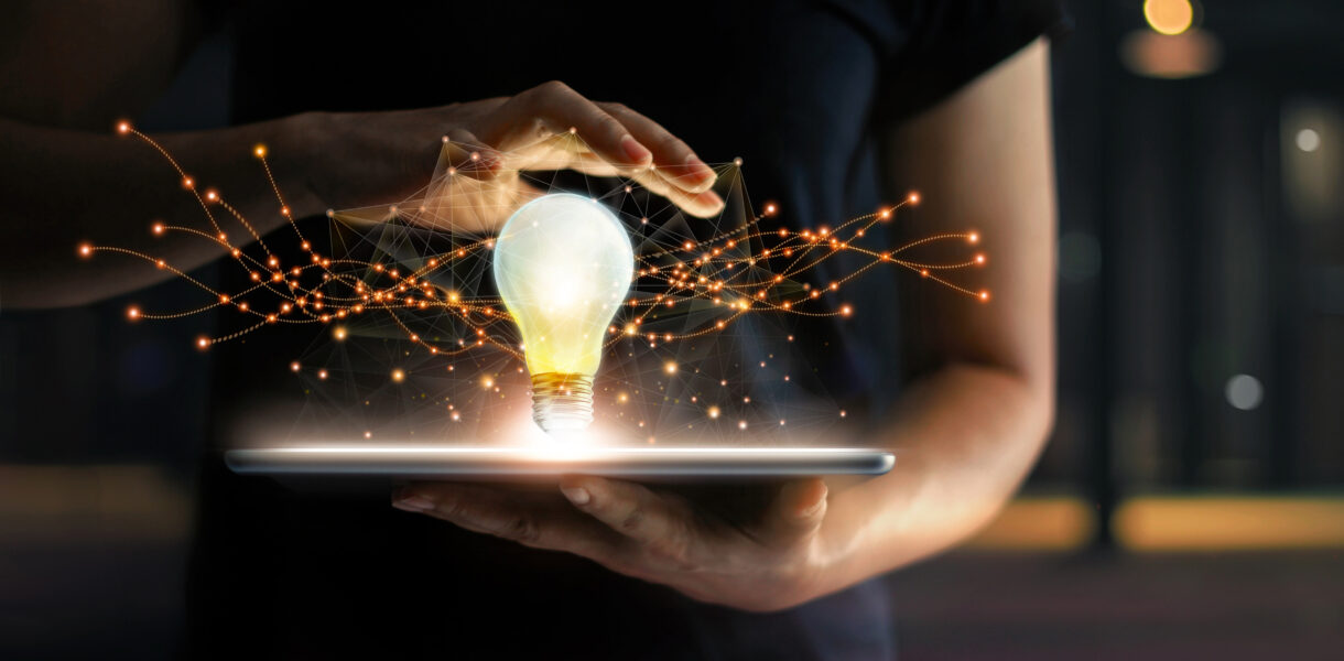 Abstract.,Innovation.,Hands,Holding,Tablet,With,Light,Bulb,Future,Technologies