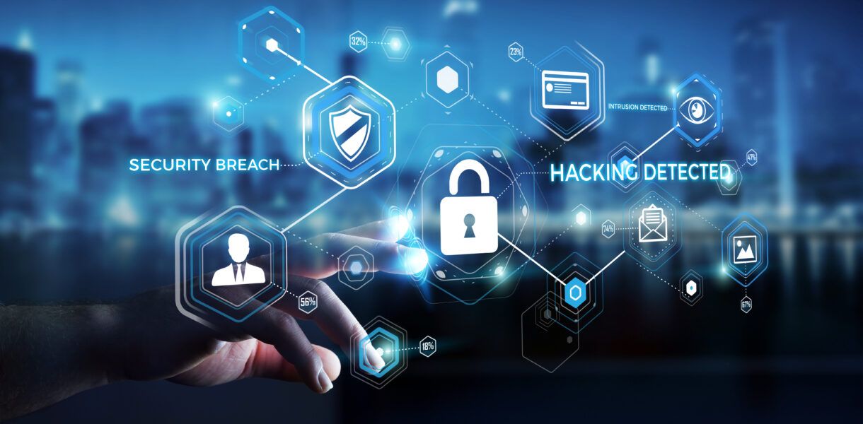 Businessman,On,Blurred,Background,Using,Antivirus,To,Block,A,Cyber