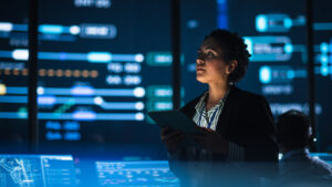 Young,Multiethnic,Female,Government,Employee,Uses,Tablet,Computer,In,System