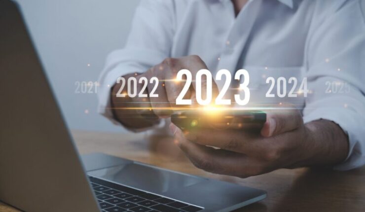 Trend,Of,2023.,People,Business,Investor,Using,Mobile,Phone,With