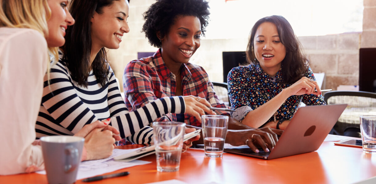 Group,Of,Female,Designers,Having,Meeting,In,Modern,Office