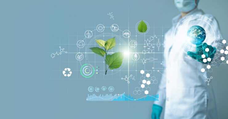 Scientists,Touching,Blue,Earth,And,Researching,Renewable,Energy,With,Plant